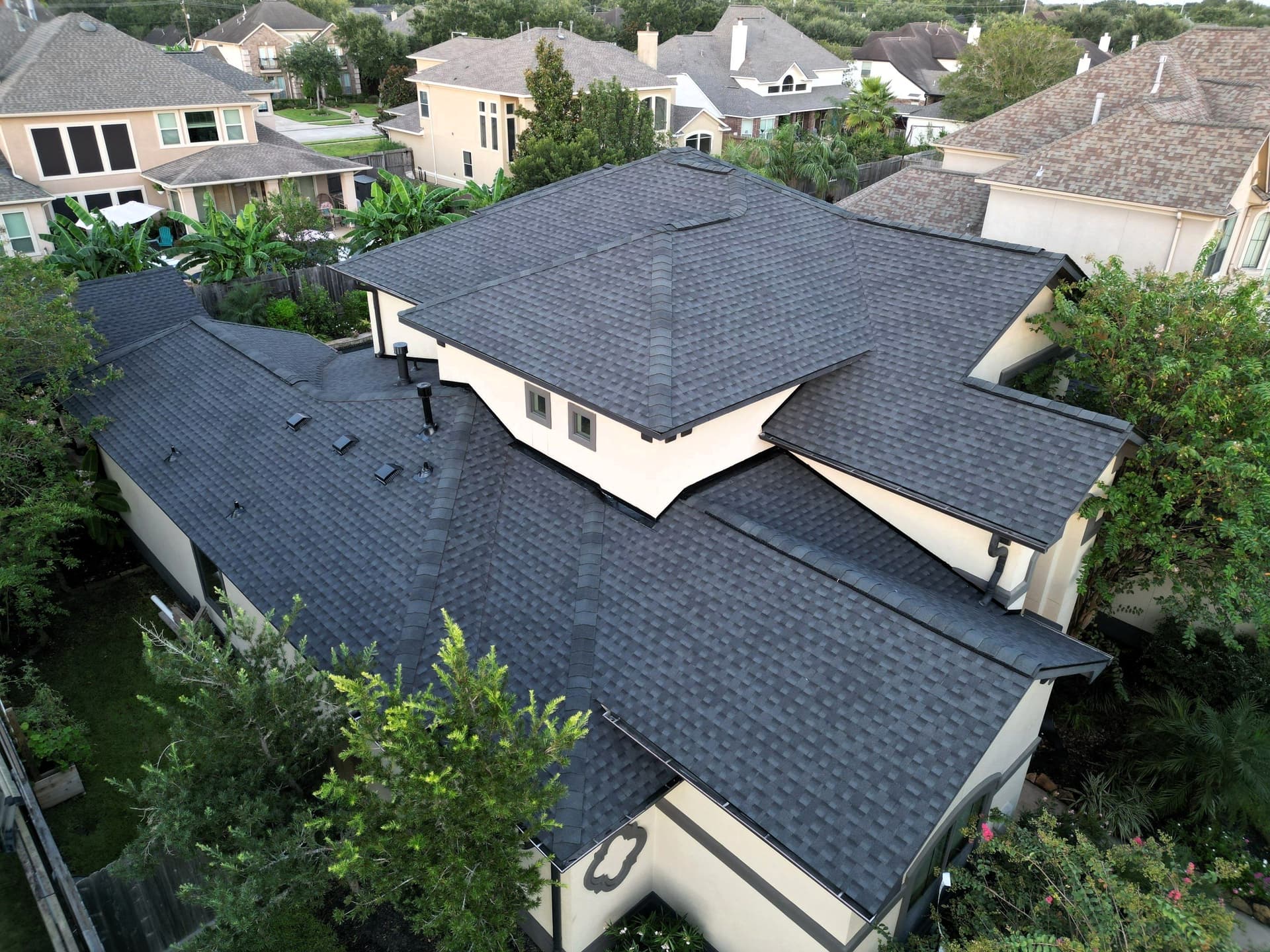Gallery photos for Two Storm-Damaged Roofs Replaced on the Same Street in Friendswood: Image #1