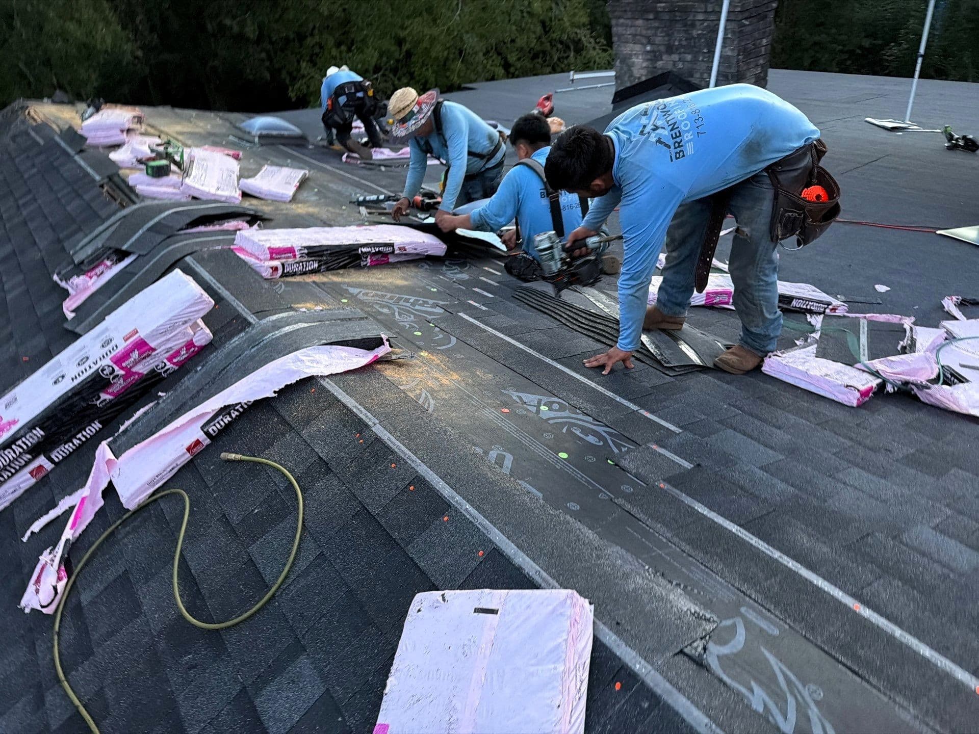 Full Roof Replacement on a Forever Home - Onyx Black Shingles on Brick image